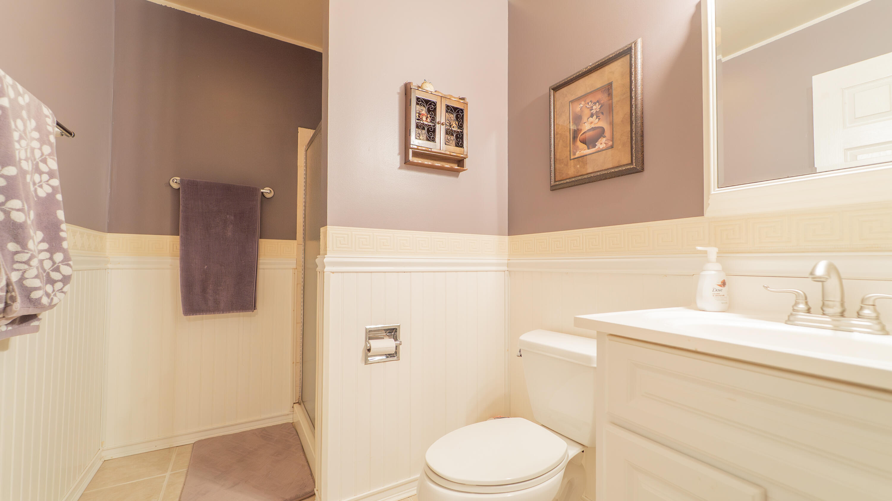 9439 Walnut Drive Munster, IN 46321 - Photo 29 of 40 a bathroom with a sink a toilet and shower