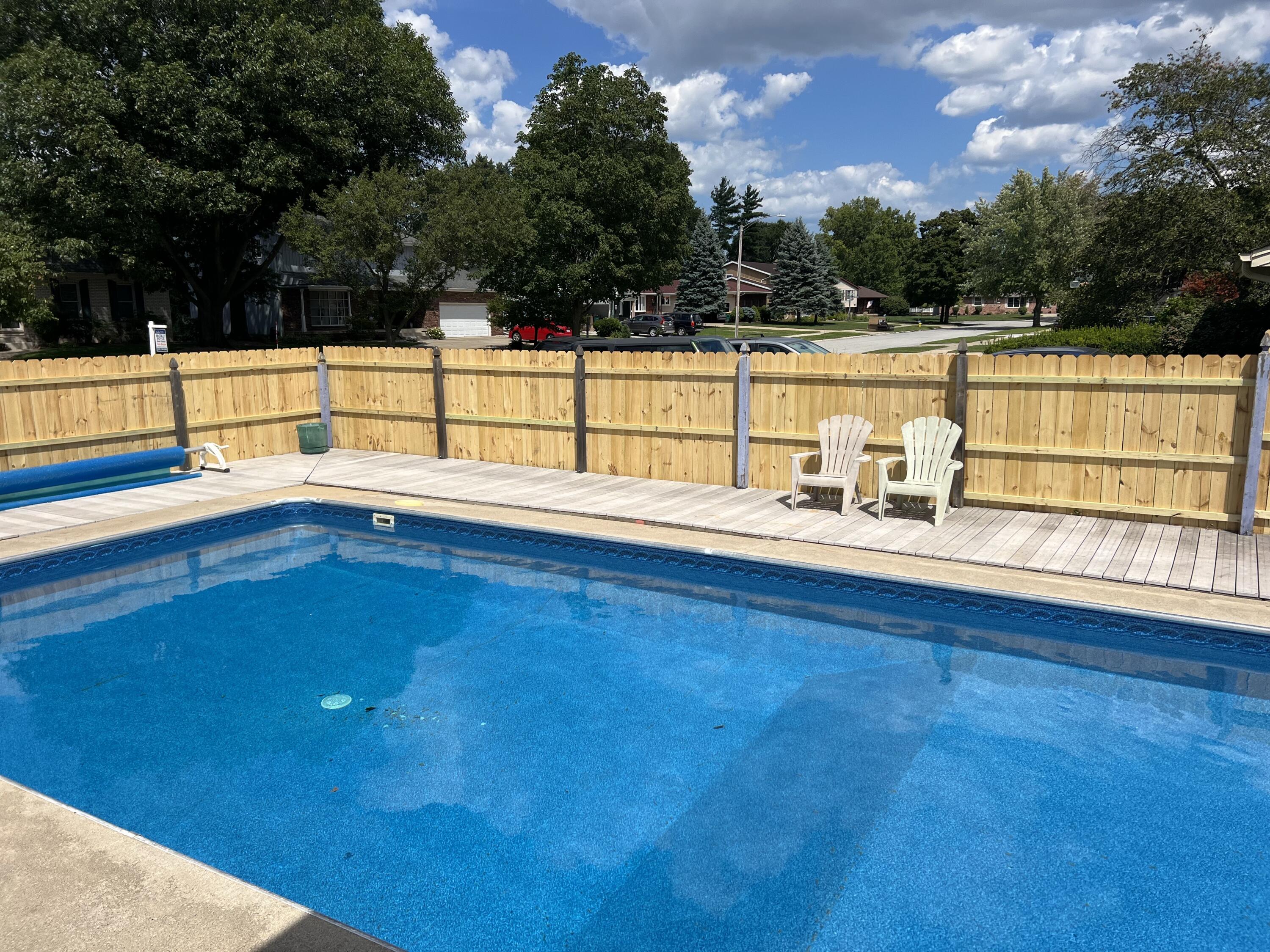 9439 Walnut Drive Munster, IN 46321 - Photo 39 of 40 a view of a swimming pool with an outdoor seating