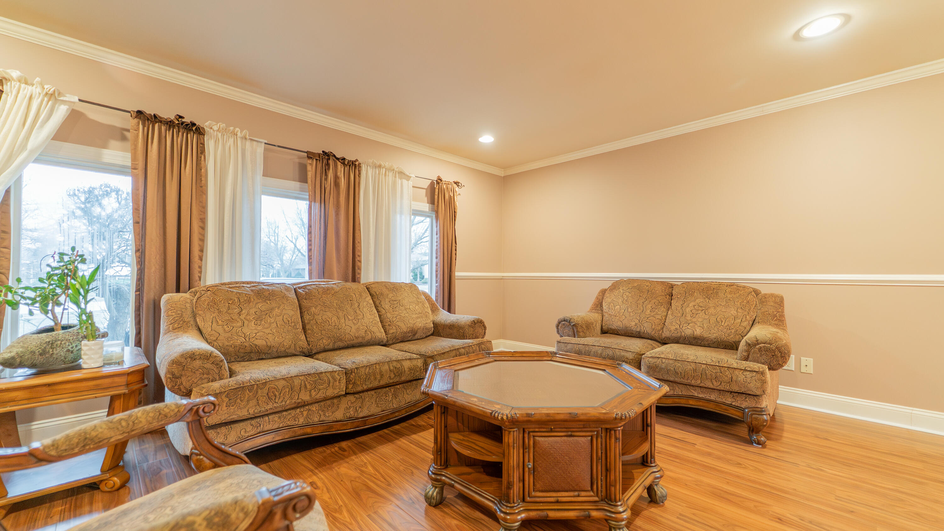 9439 Walnut Drive Munster, IN 46321 - Photo 4 of 40 a living room with furniture and a window