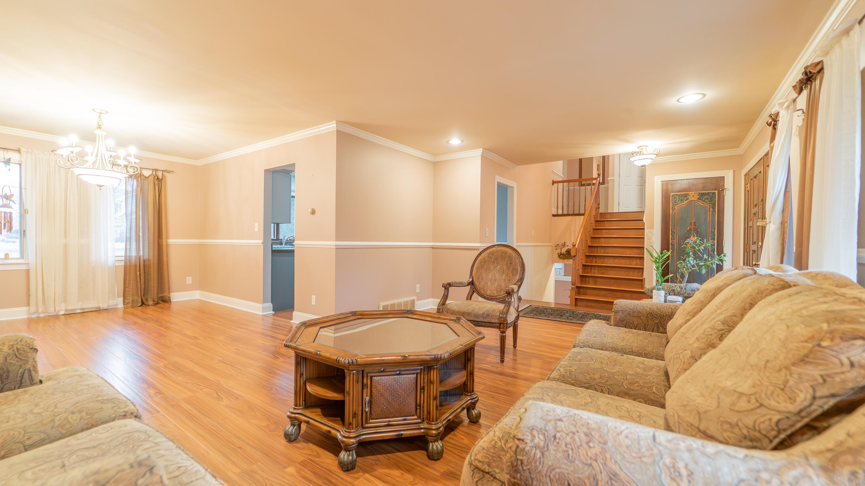 9439 Walnut Drive Munster, IN 46321 - Photo 5 of 40 a living room with furniture a bathtub and a large window