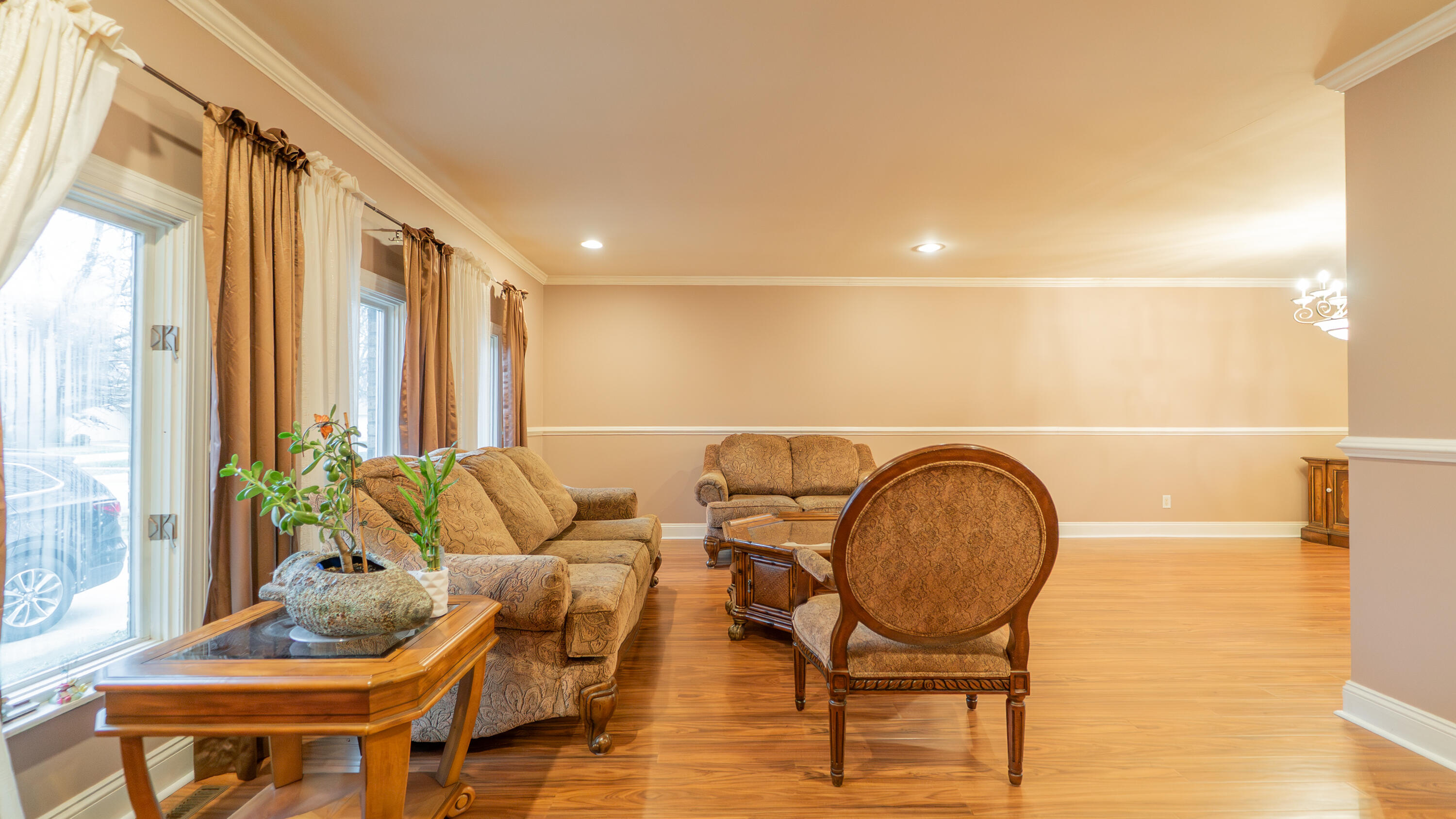 9439 Walnut Drive Munster, IN 46321 - Photo 6 of 40 a living room with furniture and a large window