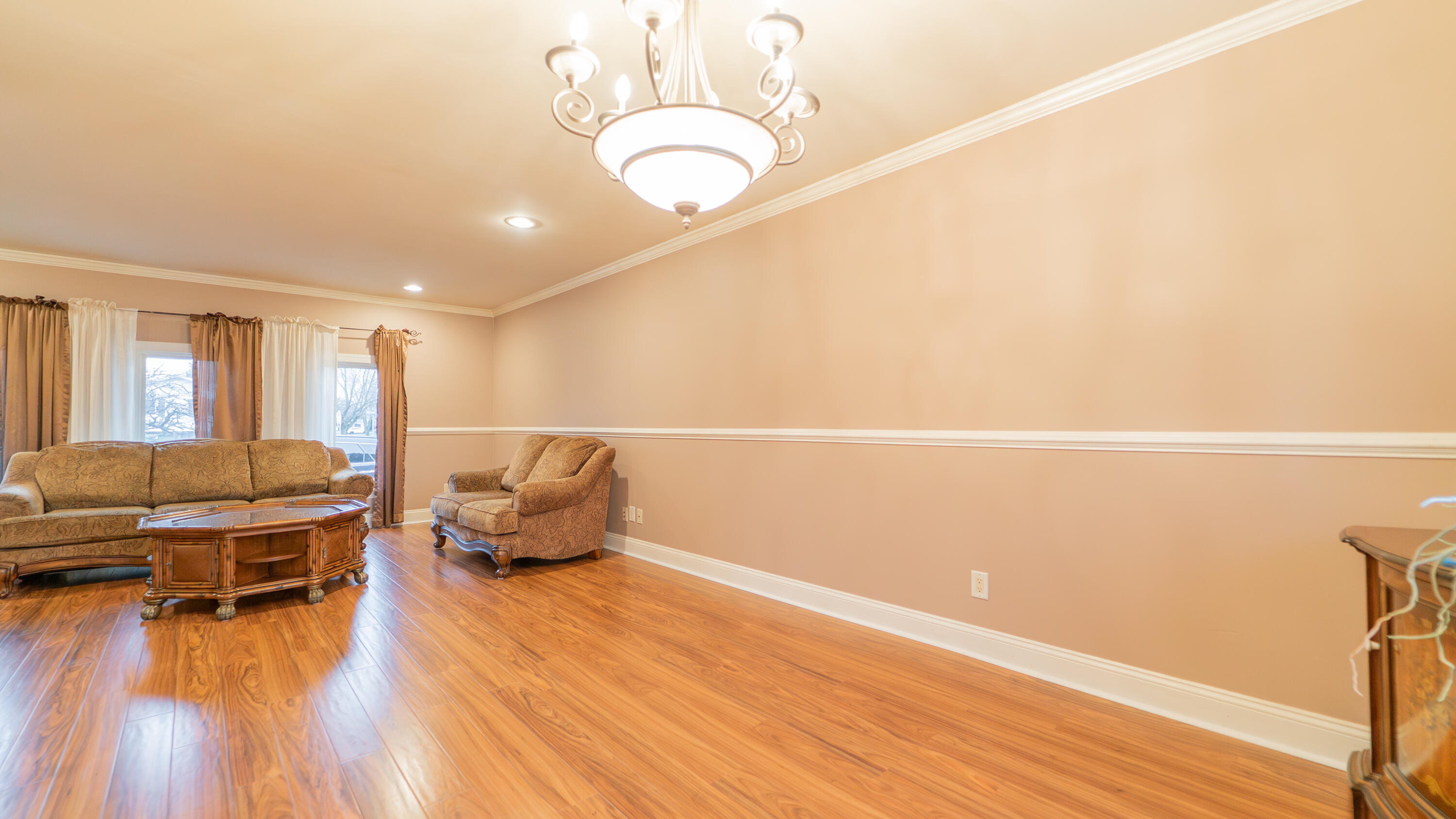 9439 Walnut Drive Munster, IN 46321 - Photo 7 of 40 a living room with furniture and a wooden floor