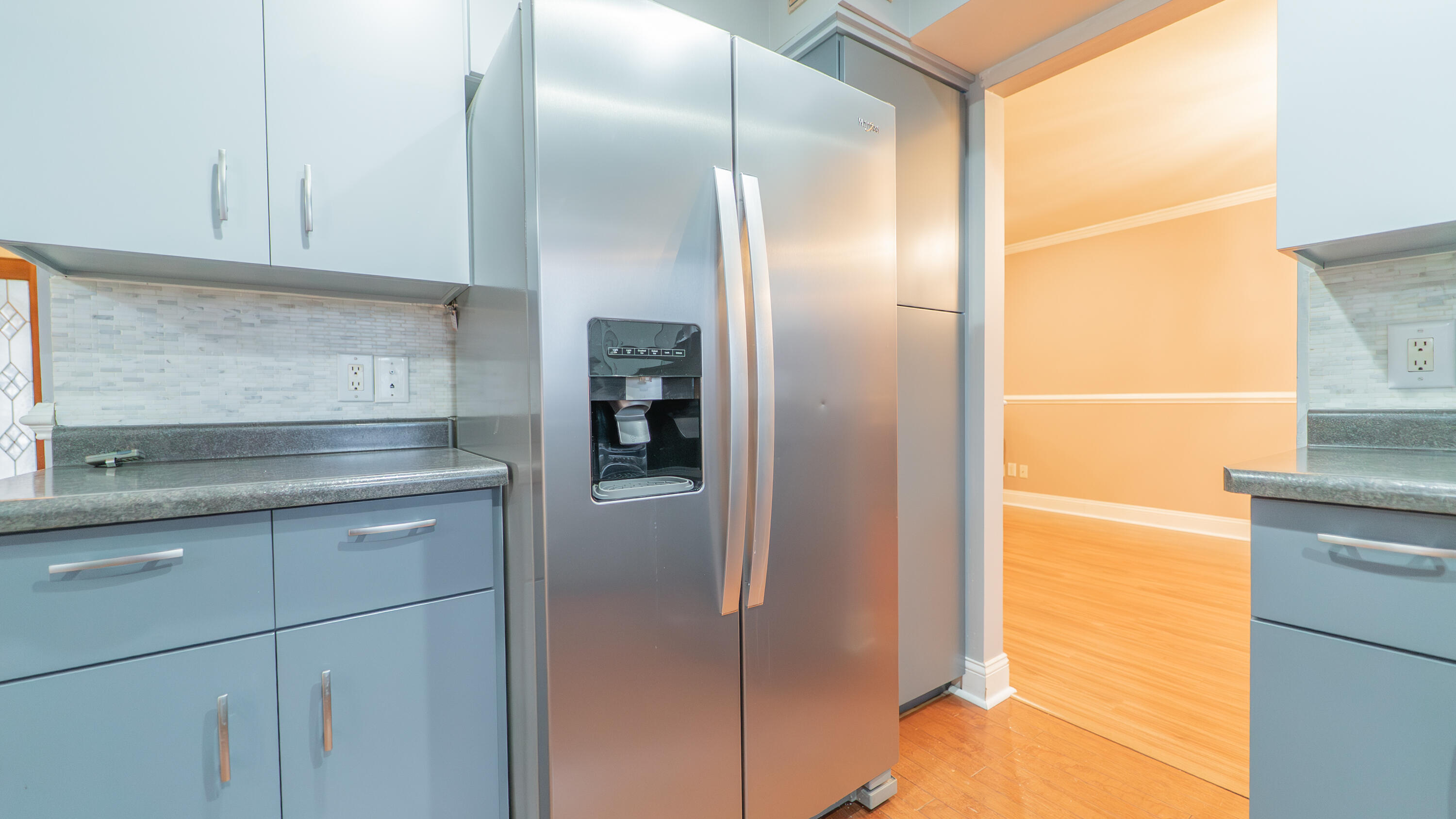9439 Walnut Drive Munster, IN 46321 - Photo 10 of 40 a kitchen with a refrigerator and a sink