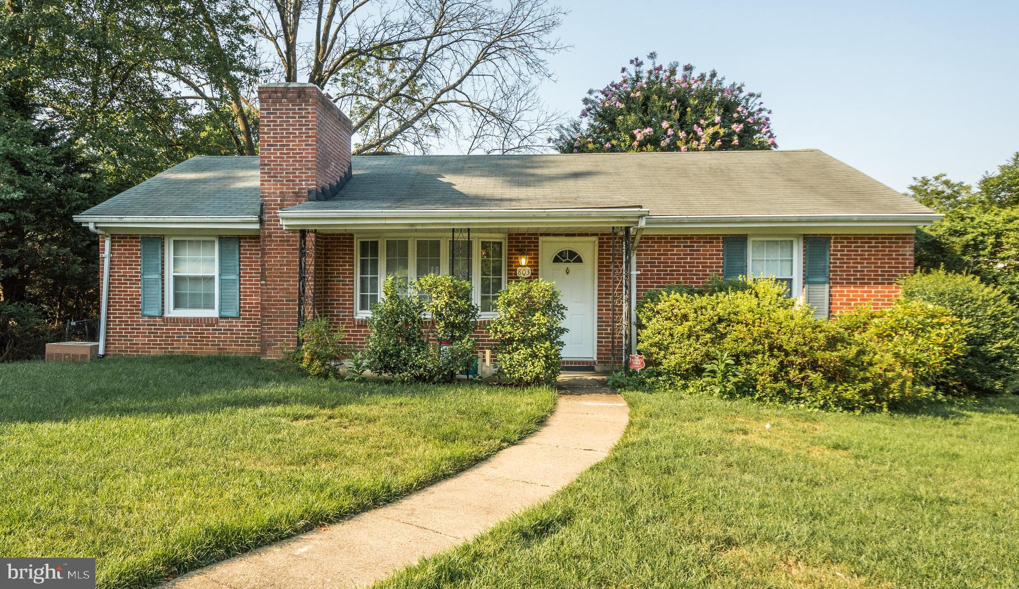 803 Quincy Road Baltimore, MD 21286 - Photo 1 of 28 a front view of house with yard and green space