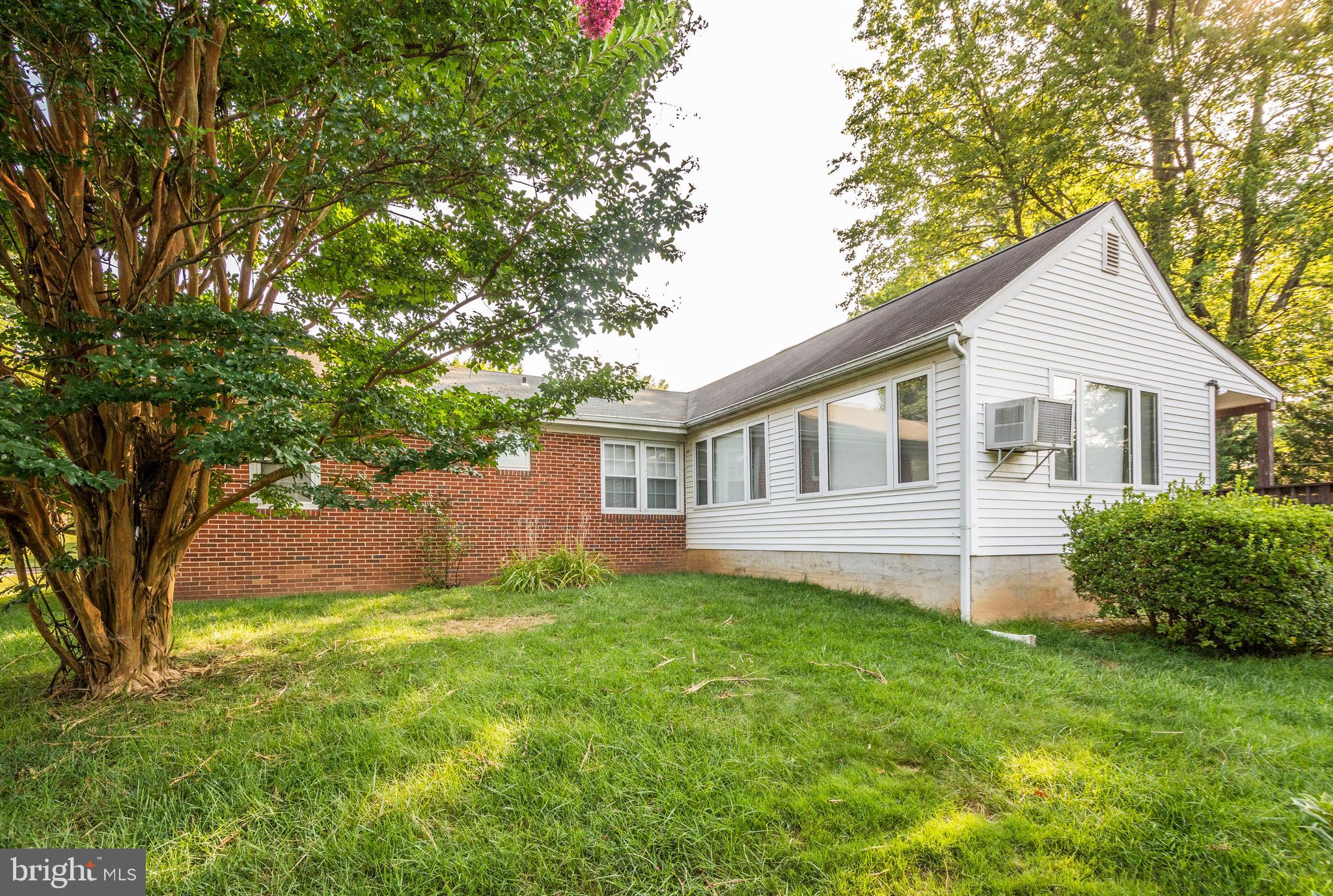 803 Quincy Road Baltimore, MD 21286 - Photo 2 of 28 a view of a house with a yard