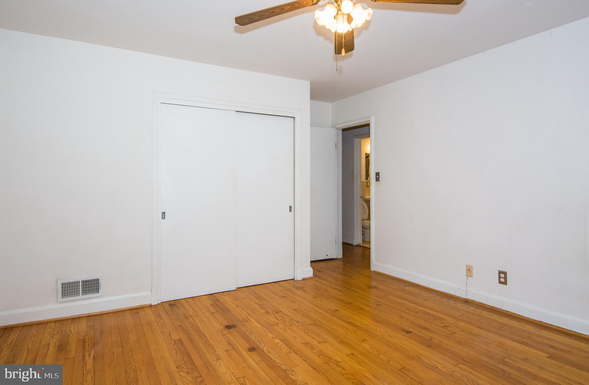 803 Quincy Road Baltimore, MD 21286 - Photo 18 of 28 a view of empty room with wooden floor