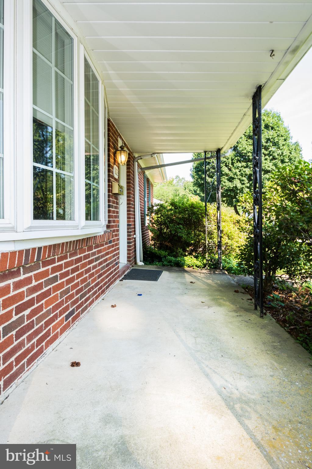 803 Quincy Road Baltimore, MD 21286 - Photo 3 of 28 a view of a porch with seating space