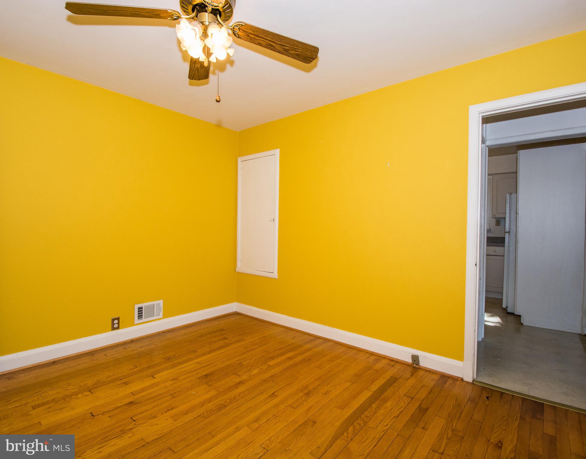 803 Quincy Road Baltimore, MD 21286 - Photo 22 of 28 a view of a room with a wooden floor