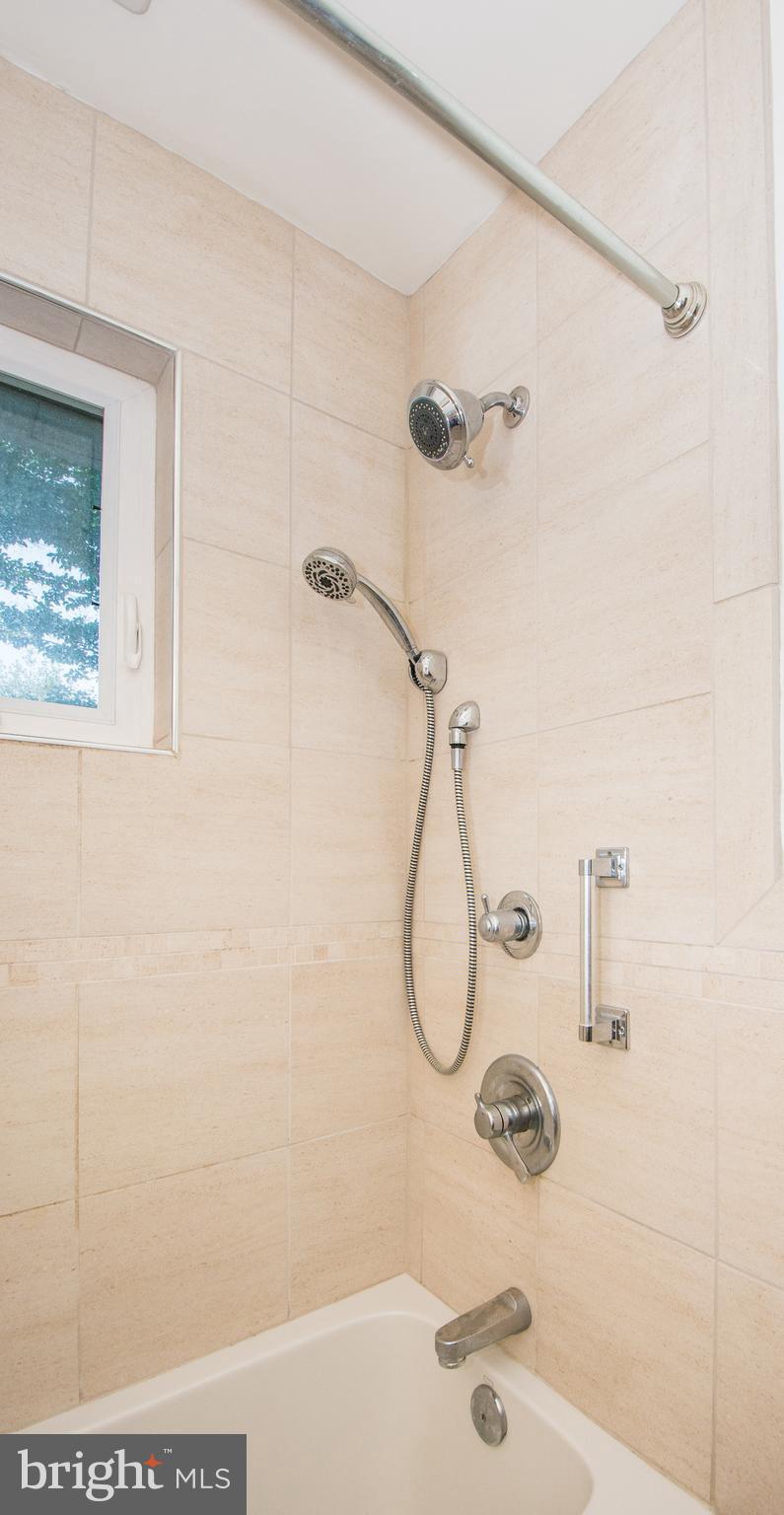 803 Quincy Road Baltimore, MD 21286 - Photo 24 of 28 a bathroom with a shower