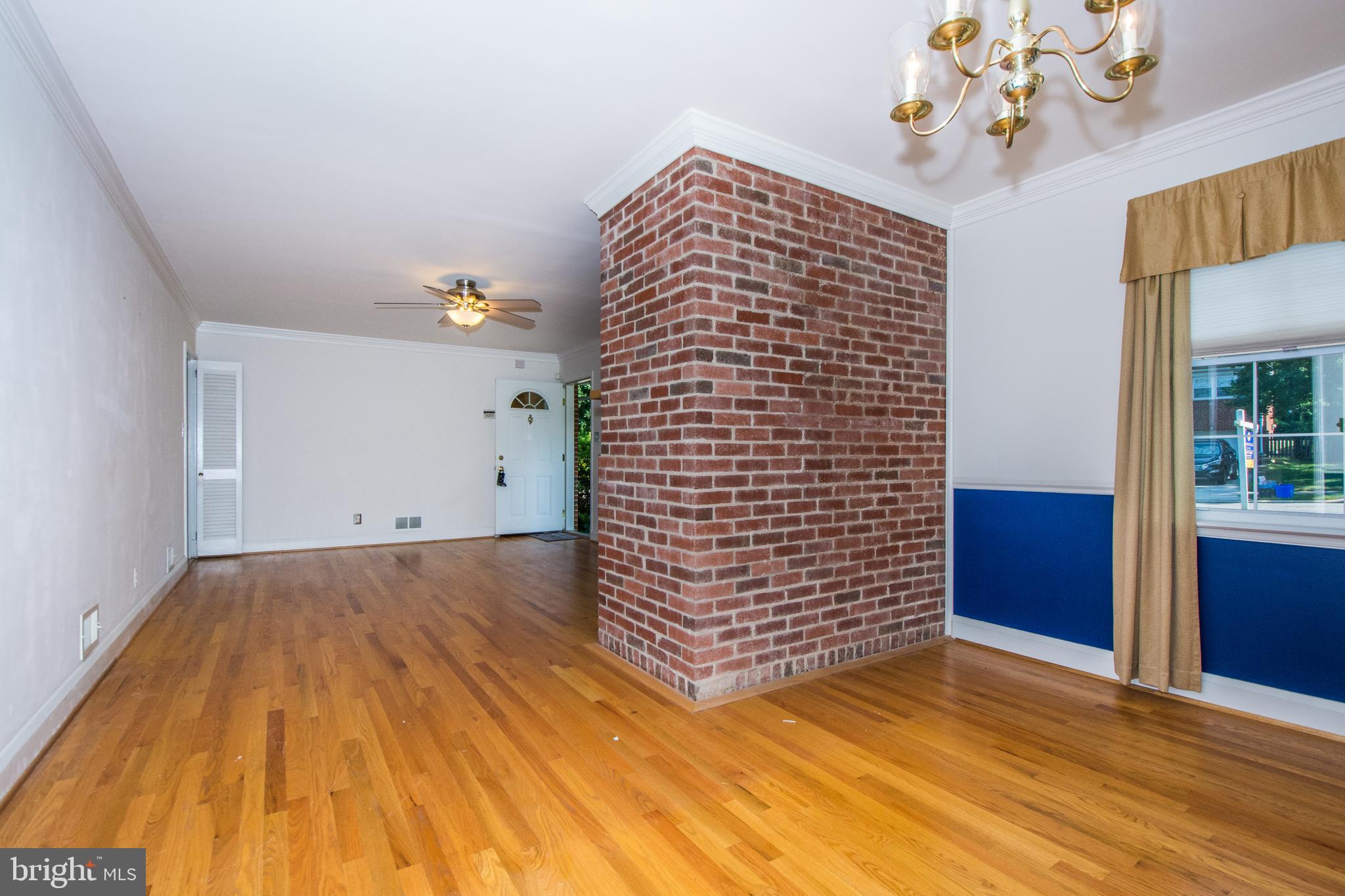 803 Quincy Road Baltimore, MD 21286 - Photo 7 of 28 a view of empty room with wooden floor