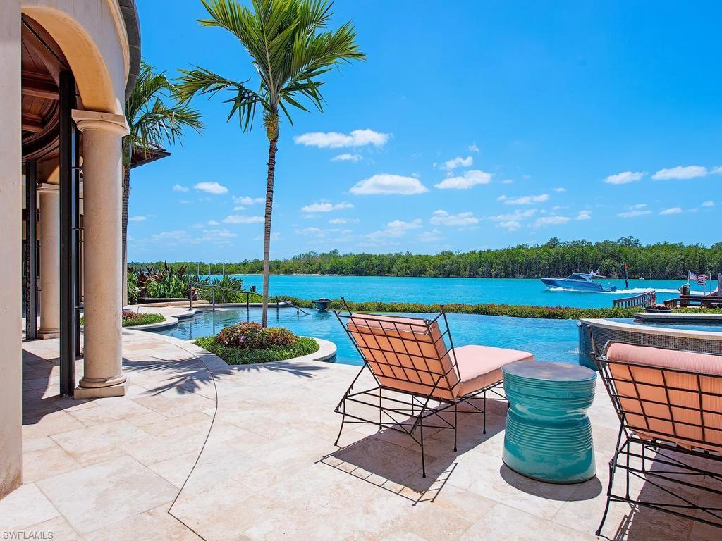 840 Admiralty Parade Naples, FL 34102 - Photo 1 of 50 a view of swimming pool and lounge chair