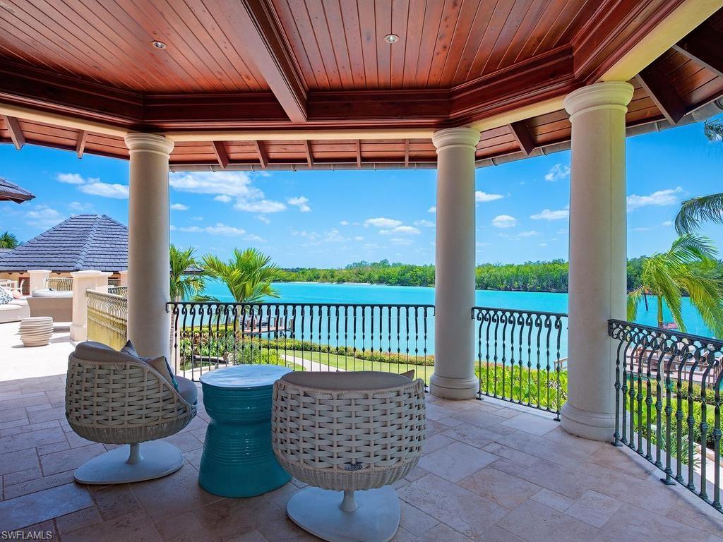 840 Admiralty Parade Naples, FL 34102 - Photo 11 of 50 a view of a porch with a couch