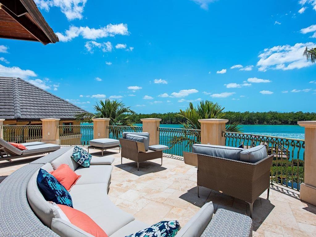 840 Admiralty Parade Naples, FL 34102 - Photo 12 of 50 a outdoor space with patio furniture