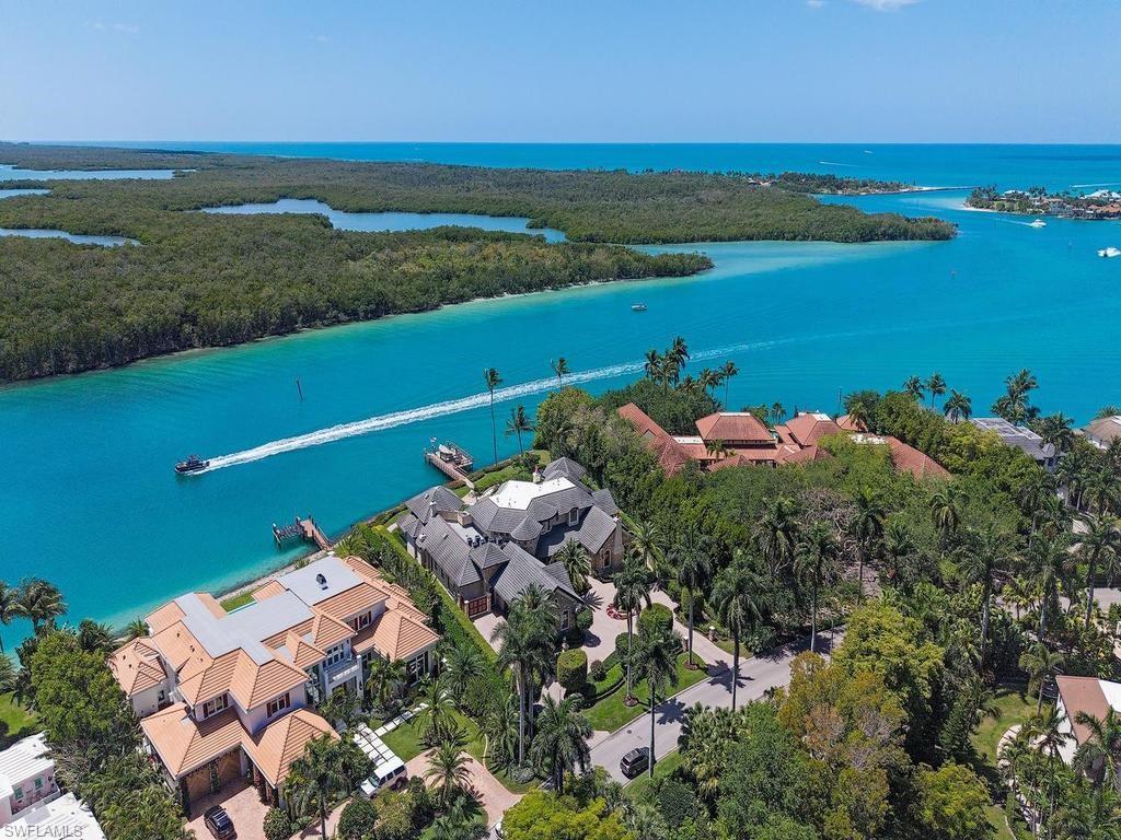 840 Admiralty Parade Naples, FL 34102 - Photo 33 of 50 an aerial view of ocean and residential houses with outdoor space