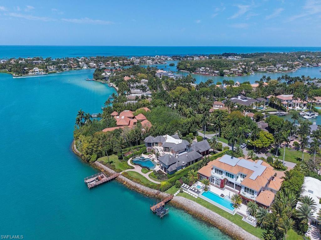 840 Admiralty Parade Naples, FL 34102 - Photo 34 of 50 an aerial view of residential house with outdoor space and lake view