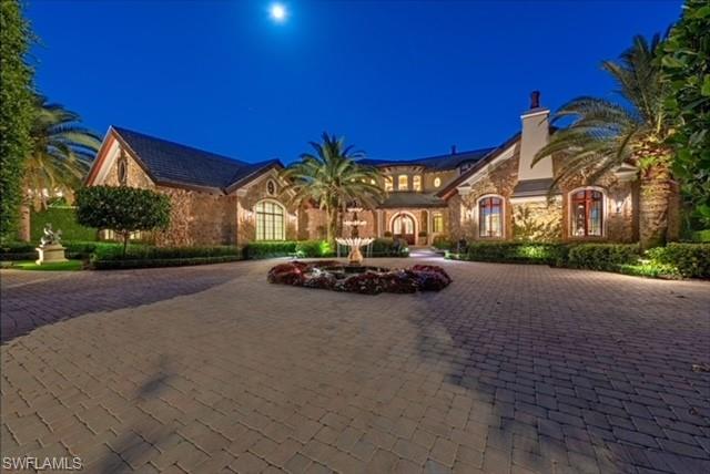 840 Admiralty Parade Naples, FL 34102 - Photo 49 of 50 a view of a building with a street