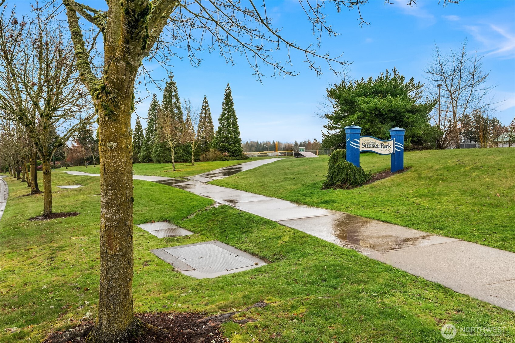 2009 62nd Loop Southeast Auburn, WA 98092 - Photo 21 of 24 a view of a park with large trees