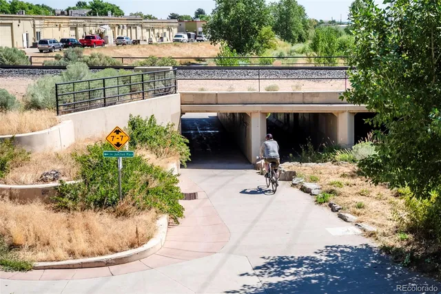 a front view of a house with a yard and sitting area