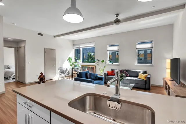 a bedroom with a bed and a night stand