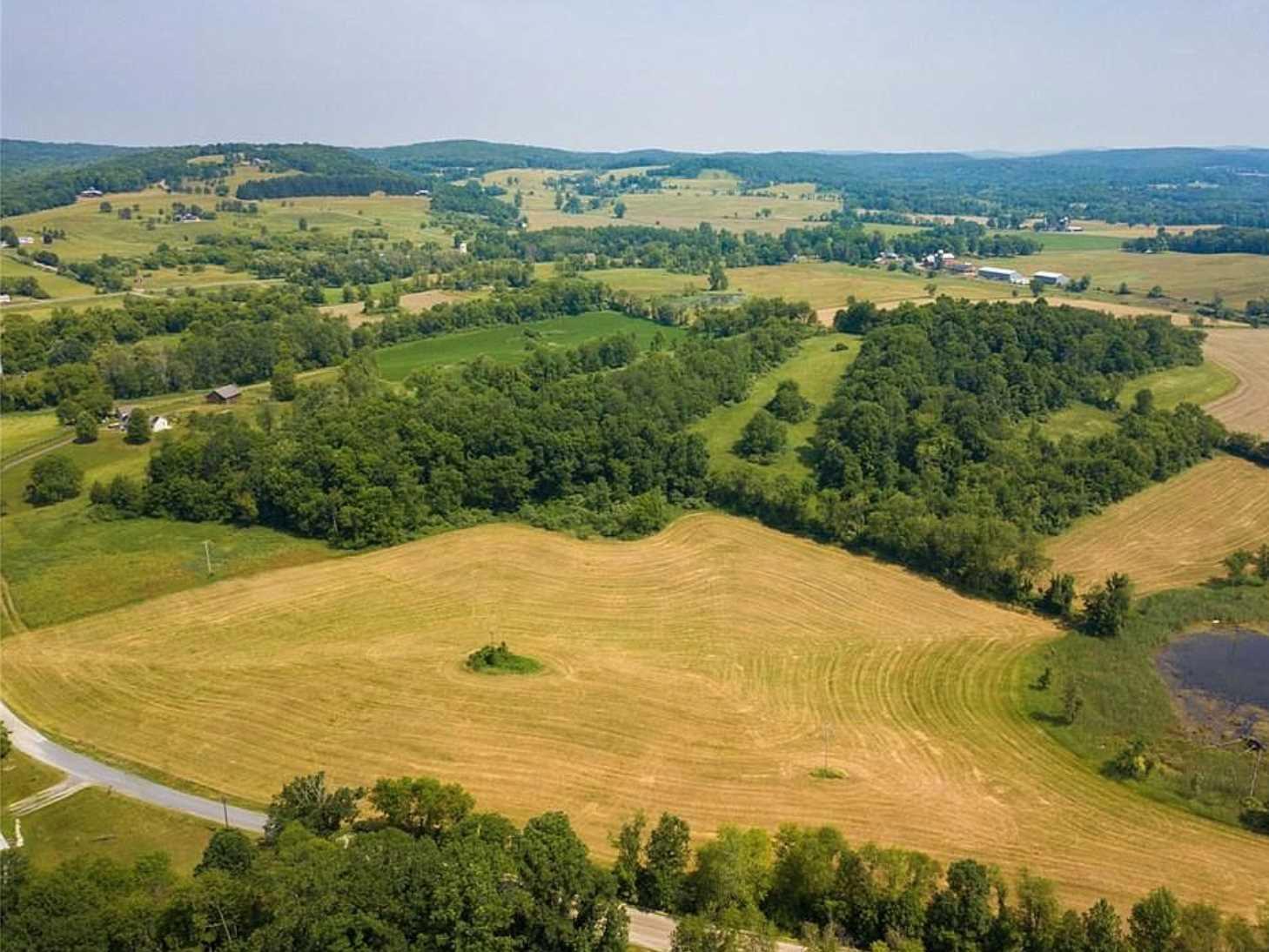a view of an ocean and mountain