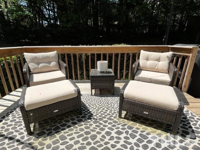 8644 Swarthmore Drive Raleigh, NC 27615 - Photo 13 of 26 a balcony with wooden floor and outdoor seating