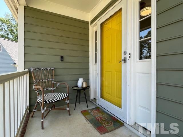 8644 Swarthmore Drive Raleigh, NC 27615 - Photo 2 of 26 a view of a balcony with wooden floor