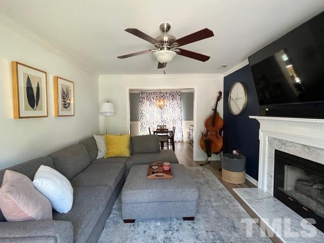 8644 Swarthmore Drive Raleigh, NC 27615 - Photo 4 of 26 a living room with furniture and a fireplace