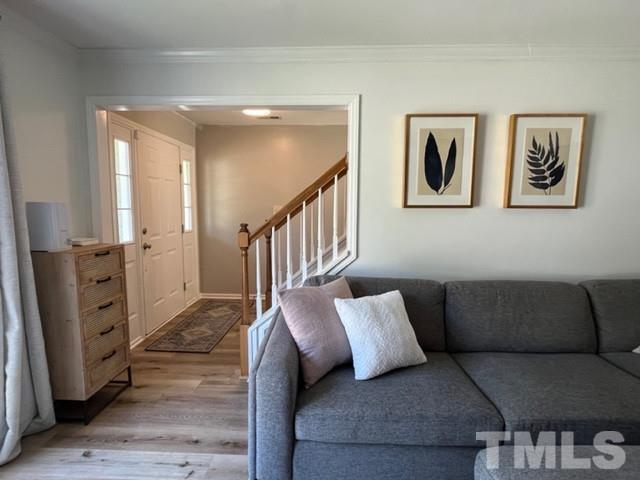 8644 Swarthmore Drive Raleigh, NC 27615 - Photo 5 of 26 a living room with furniture and wooden floor