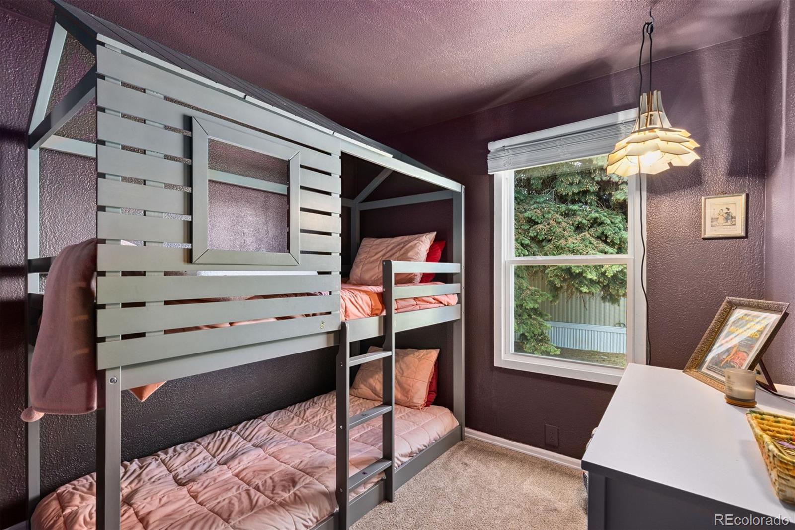 230 North 2nd Street Berthoud, CO 80513 - Photo 12 of 15 a bedroom with a bed and a window