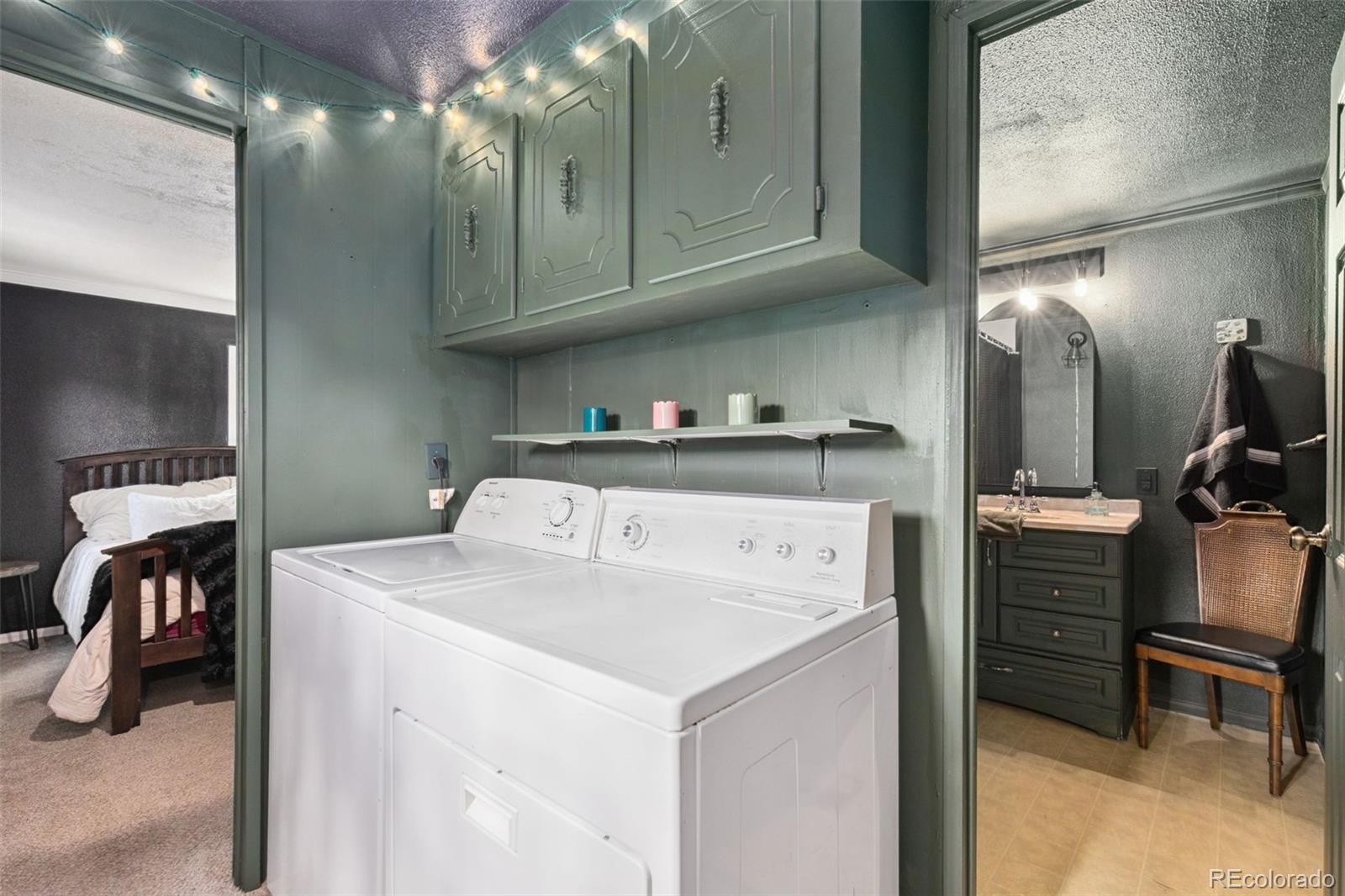 230 North 2nd Street Berthoud, CO 80513 - Photo 15 of 15 a utility room with dryer and washer
