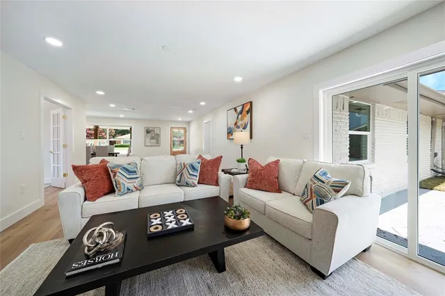 a living room with furniture and a couch