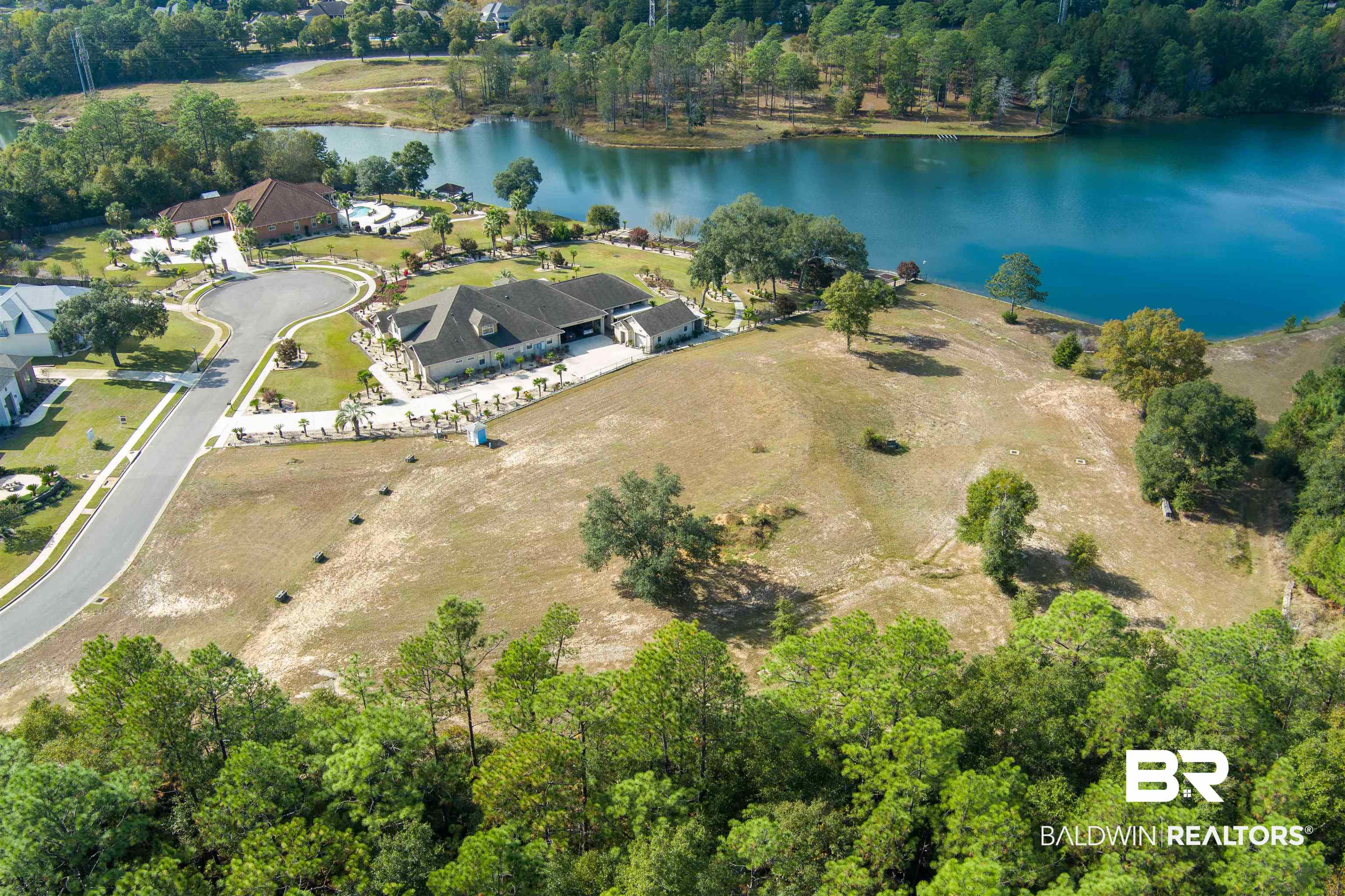 8512 Crepe Myrtle Court Mobile, AL 36619 - Photo 10 of 10 Aerial view of property's location featuring a large body of water and a forest