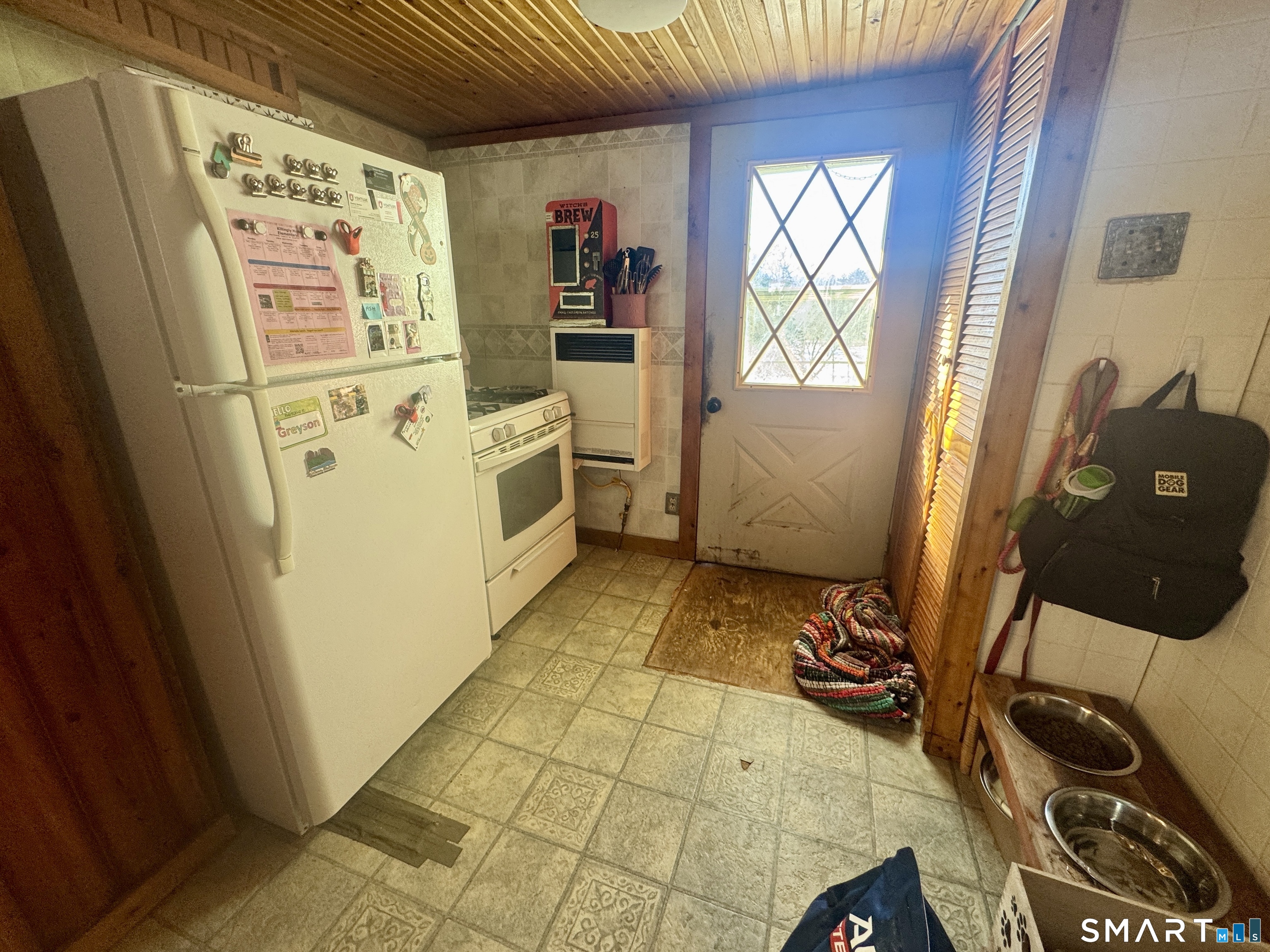 279 Putnam Pike Killingly, CT 06241 - Photo 17 of 39 a bathroom with a sink a mirror and a shower