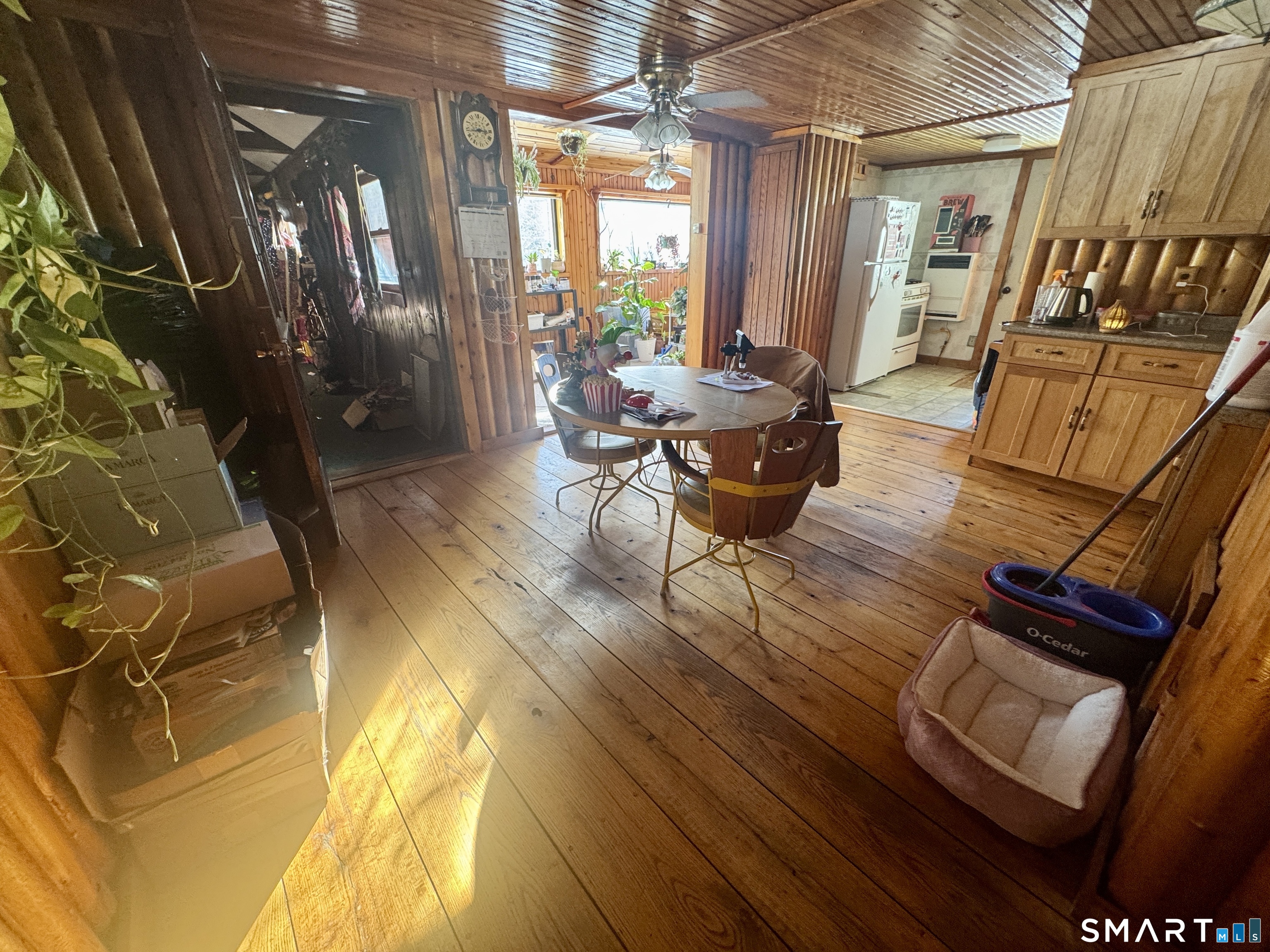 279 Putnam Pike Killingly, CT 06241 - Photo 18 of 39 a living room with furniture and a fireplace
