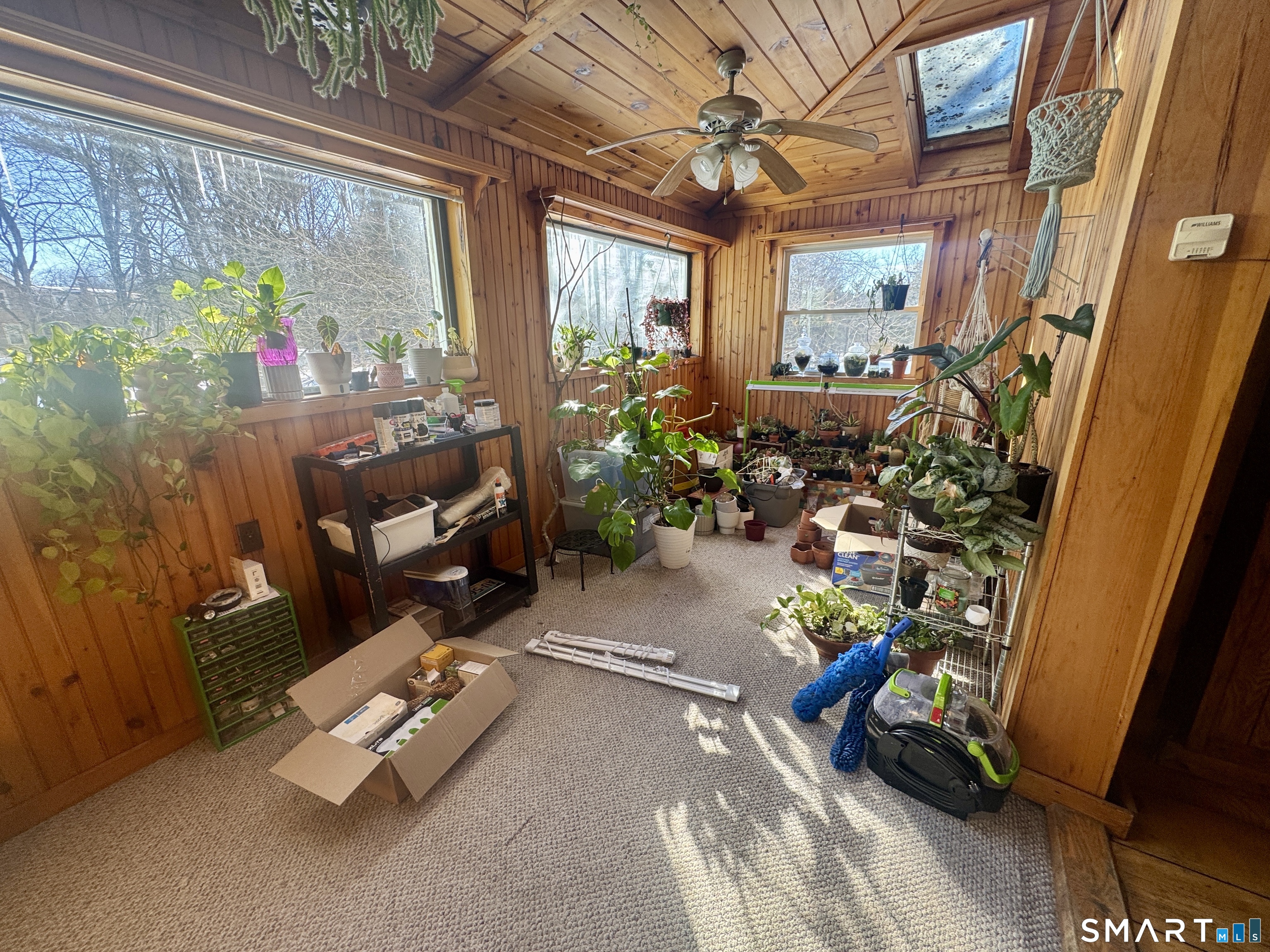 279 Putnam Pike Killingly, CT 06241 - Photo 21 of 39 a room with patio outer view and a potted plant