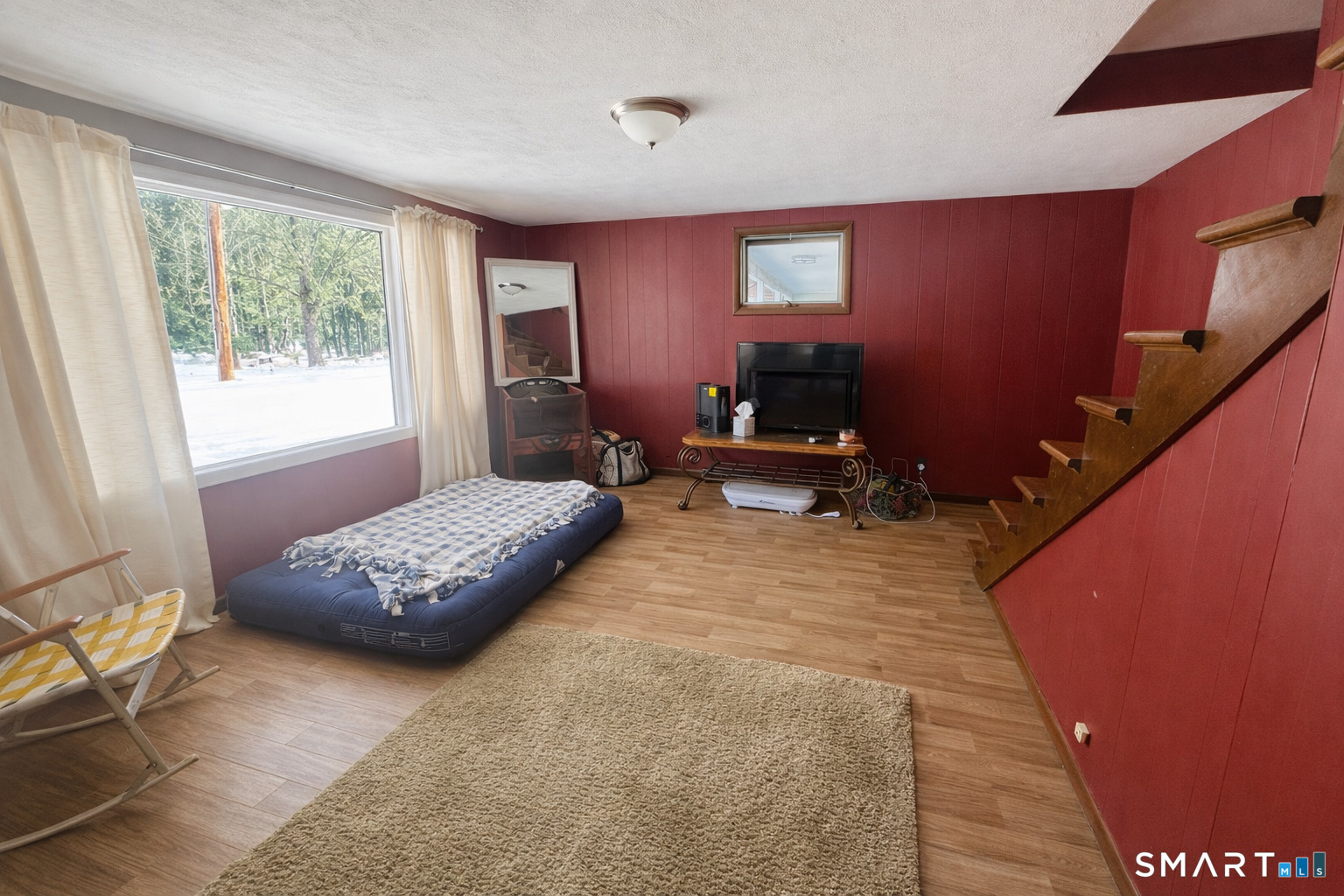 279 Putnam Pike Killingly, CT 06241 - Photo 28 of 39 a bedroom with bed and window