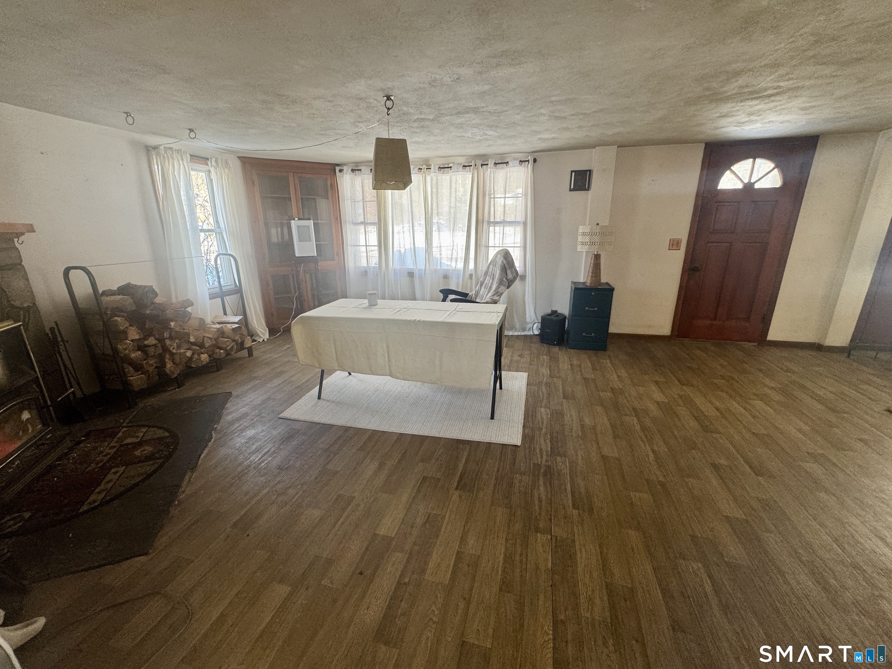 279 Putnam Pike Killingly, CT 06241 - Photo 3 of 39 a living room with furniture and a wooden floor