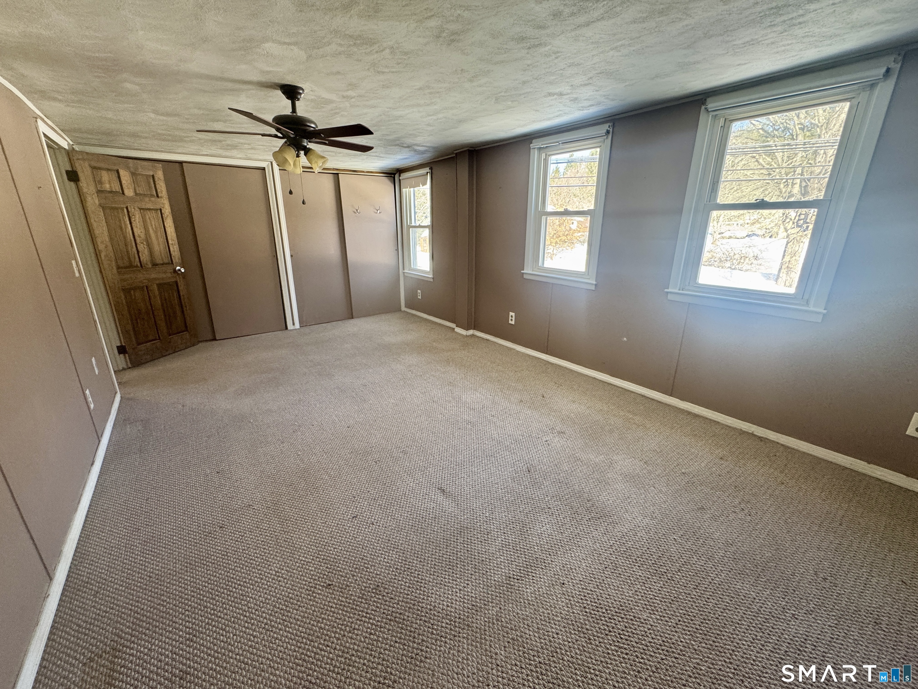 279 Putnam Pike Killingly, CT 06241 - Photo 8 of 39 a view of empty room with windows