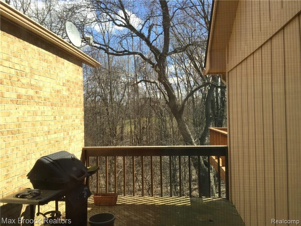 21990 River Ridge Trail, Unit 70 Farmington, MI 48335 - Photo 15 of 27 View from Library