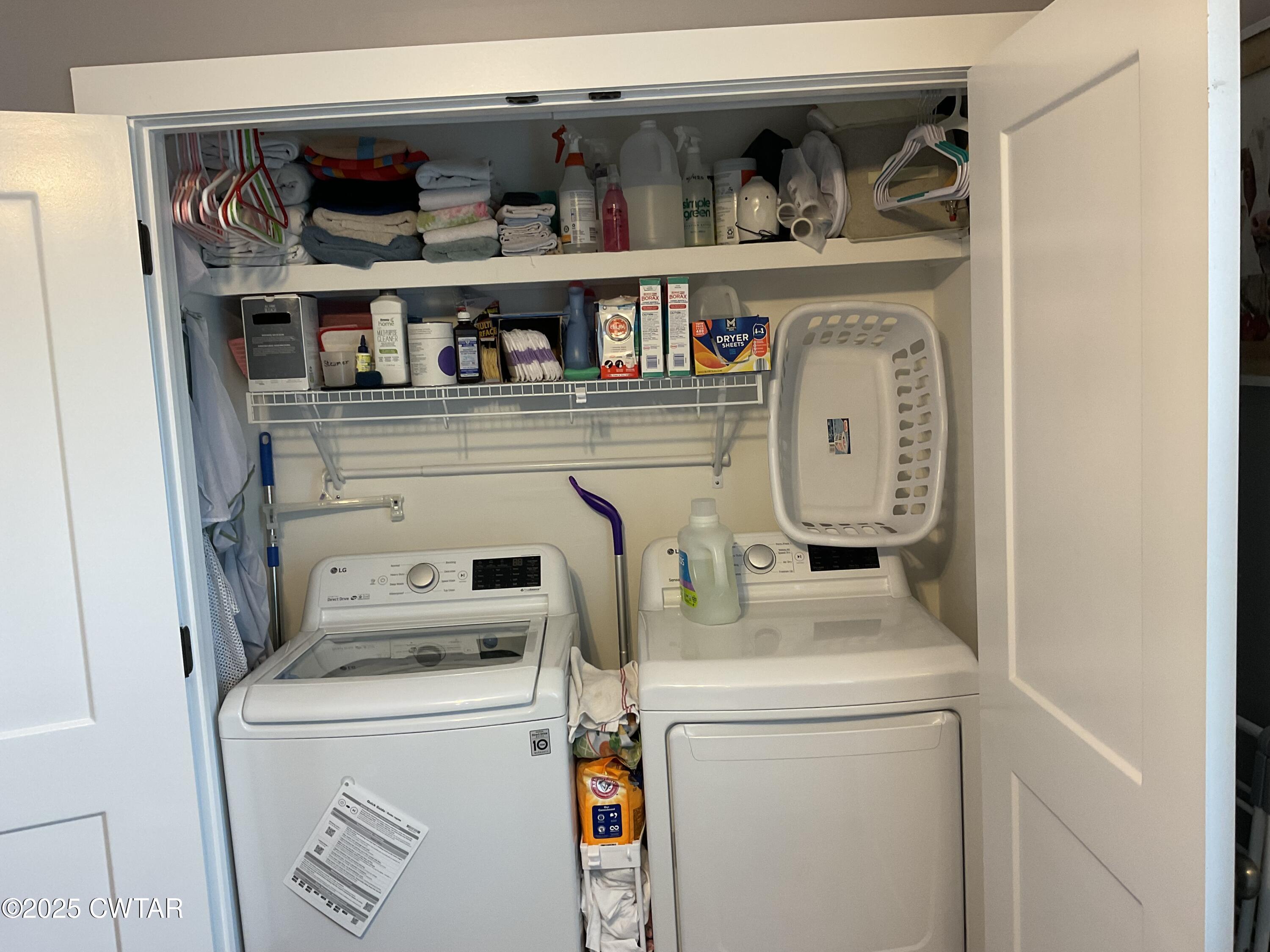 28 Beaver Cove Jackson, TN 38305 - Photo 8 of 18 a utility room with dryer and washer