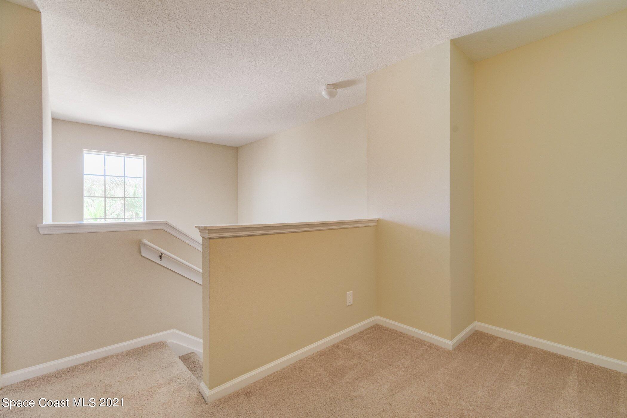 2780 Reston Street, Unit 102 Melbourne, FL 32935 - Photo 13 of 36 Computer Niche at top of Stairs