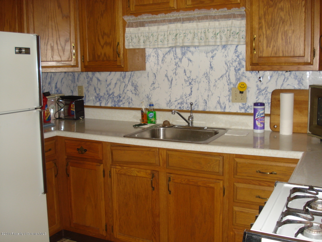 1 Rr Springville, PA 18844 - Photo 3 of 7 a kitchen with stainless steel appliances granite countertop a sink stove and cabinets