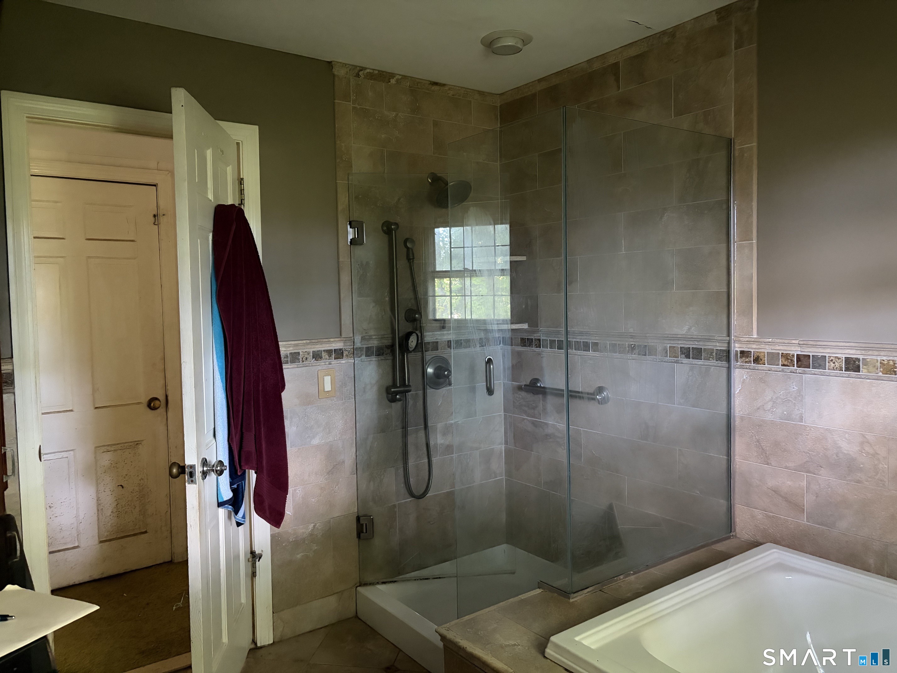 101 Partridgetown Road Naugatuck, CT 06770 - Photo 16 of 31 The huge main level bathroom offers room for a large soaking tub and a spacious stand-alone shower.