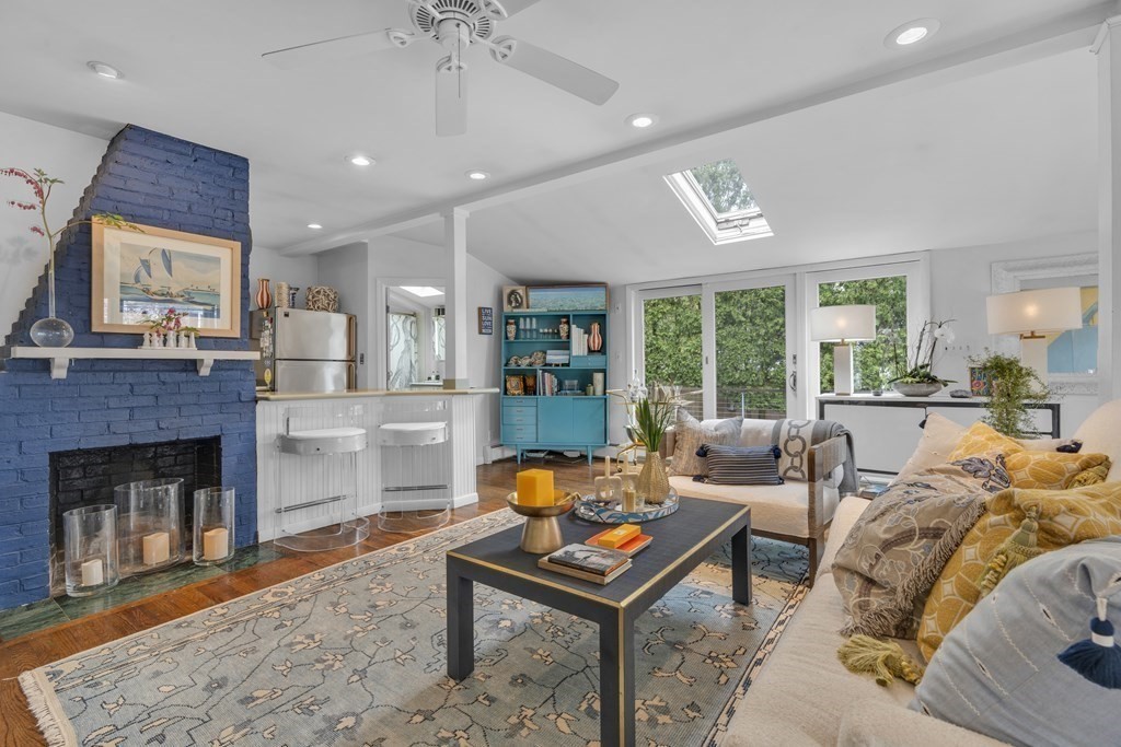 94 Pitman Road Marblehead, MA 01945 - Photo 16 of 35 a living room with furniture and a fireplace