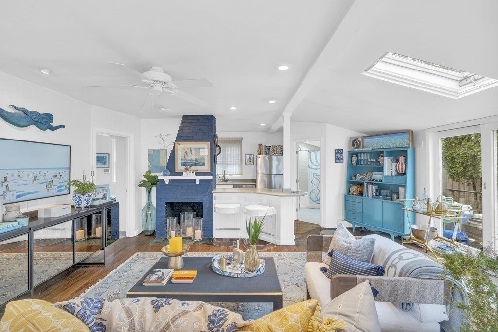 94 Pitman Road Marblehead, MA 01945 - Photo 17 of 35 a living room with furniture and a fireplace