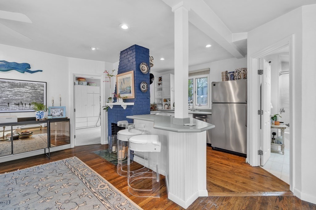 94 Pitman Road Marblehead, MA 01945 - Photo 19 of 35 a kitchen with stainless steel appliances granite countertop a refrigerator and a stove top oven