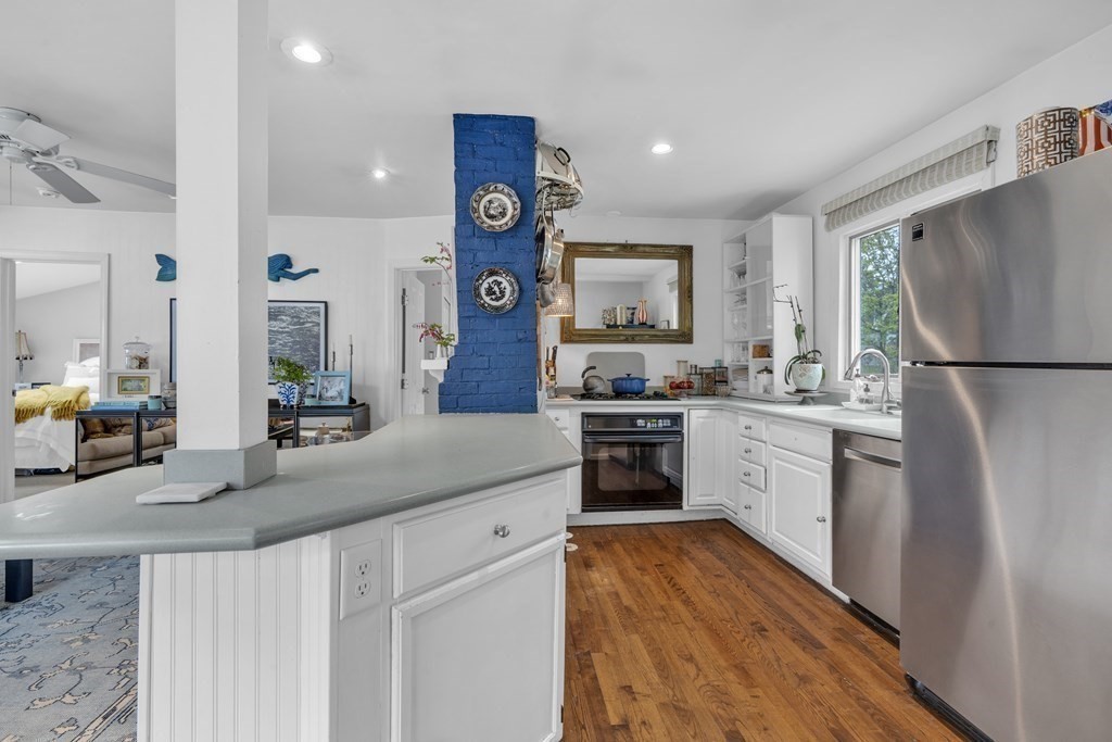 94 Pitman Road Marblehead, MA 01945 - Photo 21 of 35 a kitchen with a refrigerator and a sink