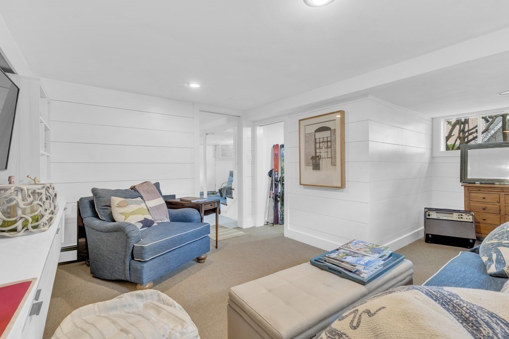 94 Pitman Road Marblehead, MA 01945 - Photo 27 of 35 a living room with furniture and painting on the wall