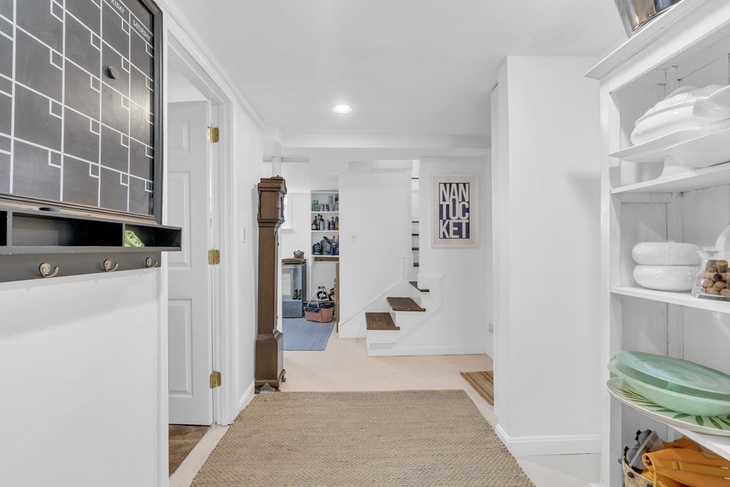 94 Pitman Road Marblehead, MA 01945 - Photo 28 of 35 a view of a kitchen with refrigerator and cabinets