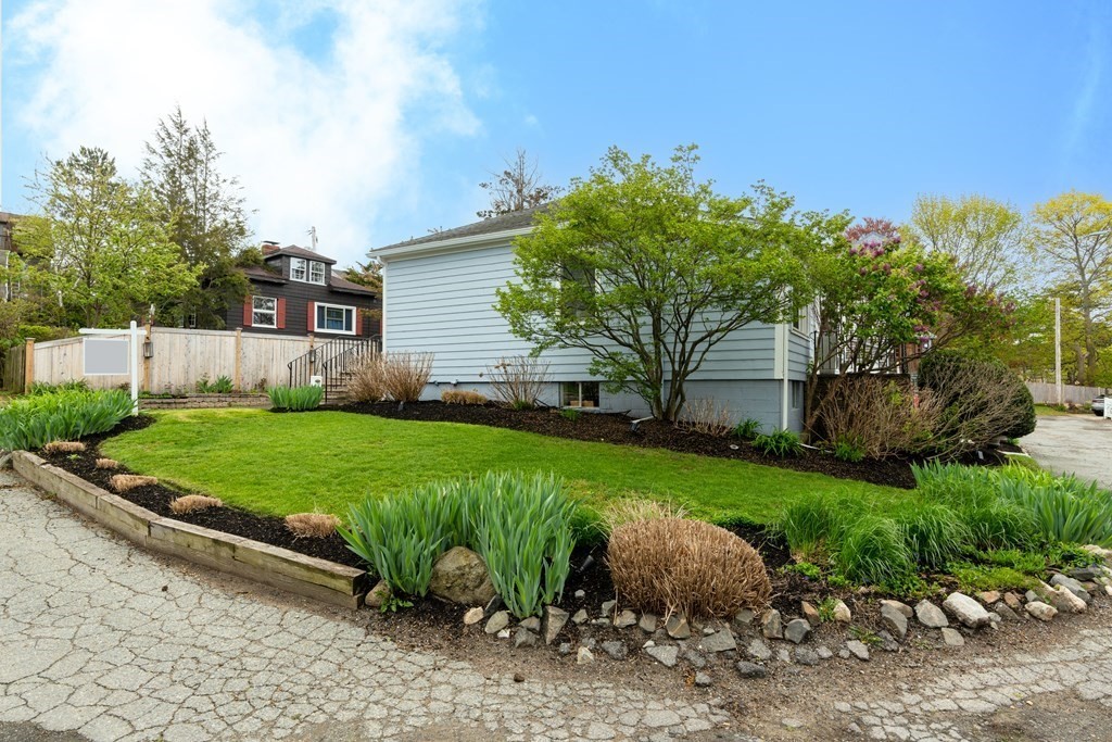 94 Pitman Road Marblehead, MA 01945 - Photo 34 of 35 a view of a backyard with garden